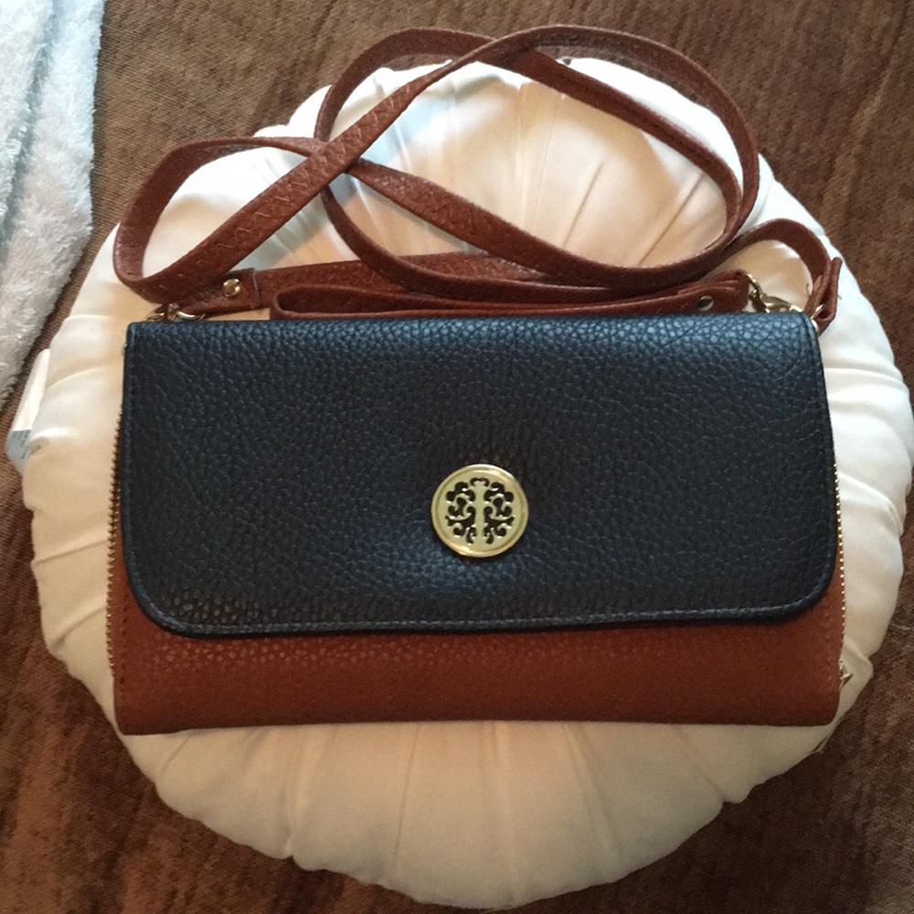 Brown/tan wristlet/crossbody/wallet.